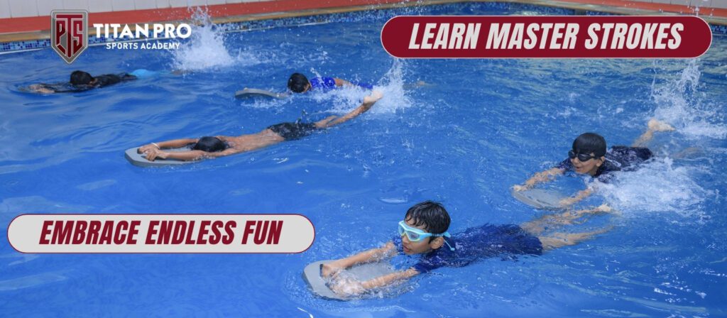 Kids swimming in the indoor pool in Titan Pro Sports Academy of Sharjah